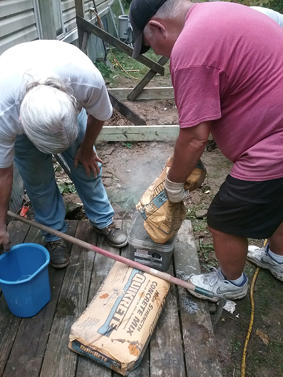 Dave and LeRoy Mix Concrete